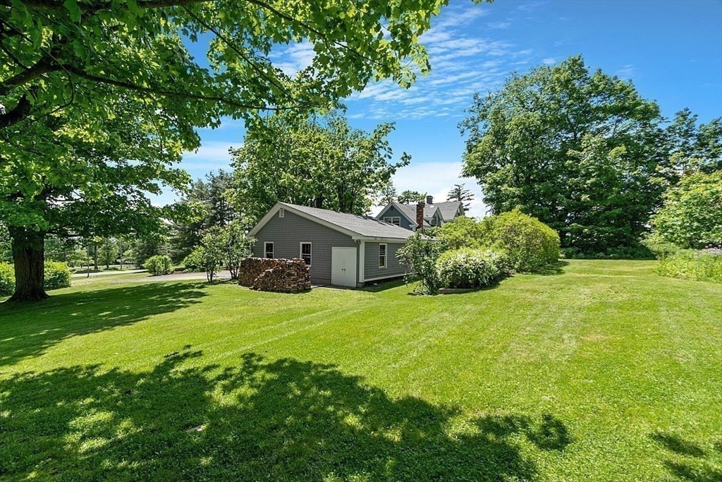 15 Osgood Road Sterling, MA 01564 - Photo 27 of 31 a view of a house with a big yard plants and large trees