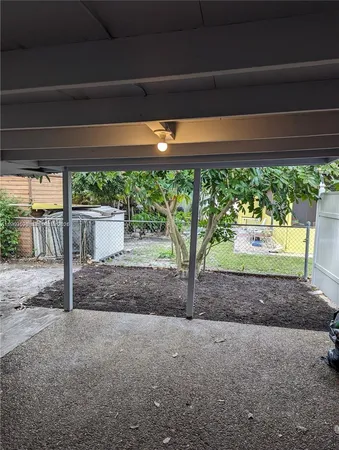 a view of backyard and porch