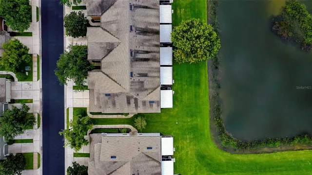 an aerial view of a house with a garden