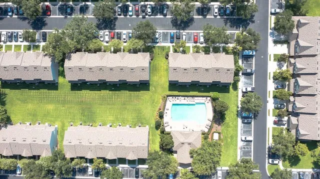 an aerial view of ocean with residential building and ocean view