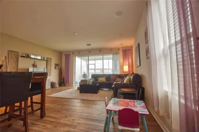 a living room with furniture or couch and a window
