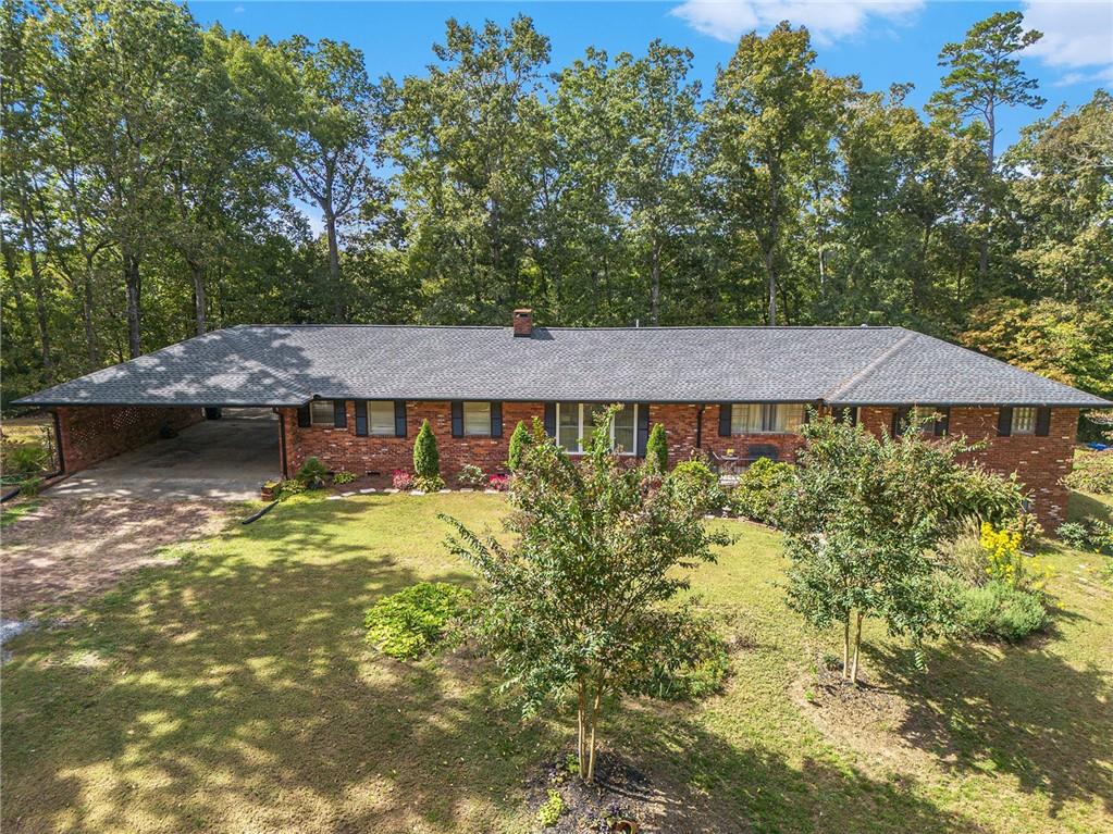 111 Lewis Drive Southeast Calhoun, GA 30701 - Photo 1 of 53 a view of a house with garden