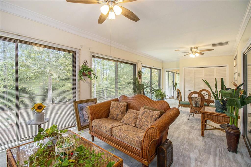 111 Lewis Drive Southeast Calhoun, GA 30701 - Photo 18 of 53 a living room with furniture and a large window