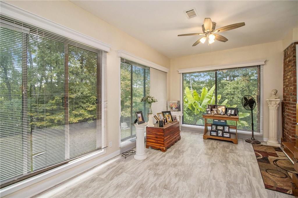 111 Lewis Drive Southeast Calhoun, GA 30701 - Photo 22 of 53 a living room with furniture and a large window
