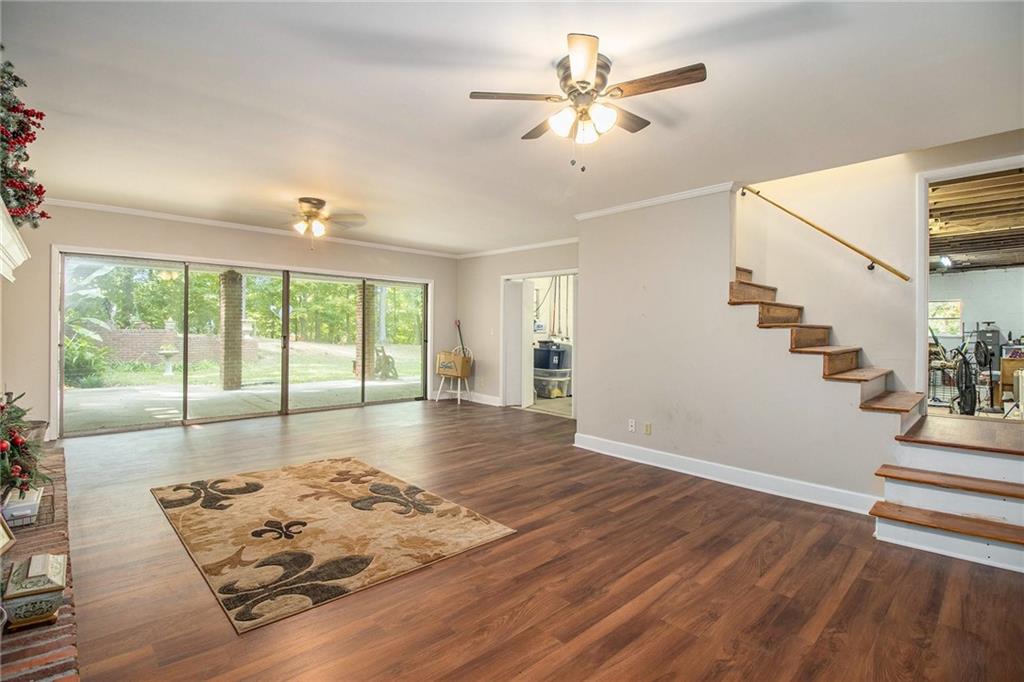 111 Lewis Drive Southeast Calhoun, GA 30701 - Photo 35 of 53 wooden floor in an empty room with a window