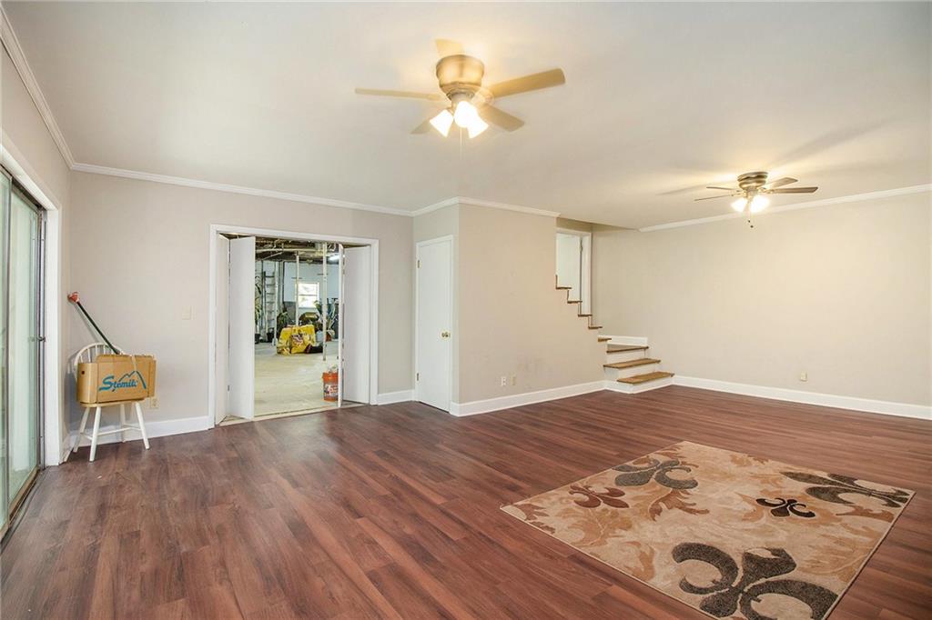 111 Lewis Drive Southeast Calhoun, GA 30701 - Photo 36 of 53 wooden floor in an empty room with a window