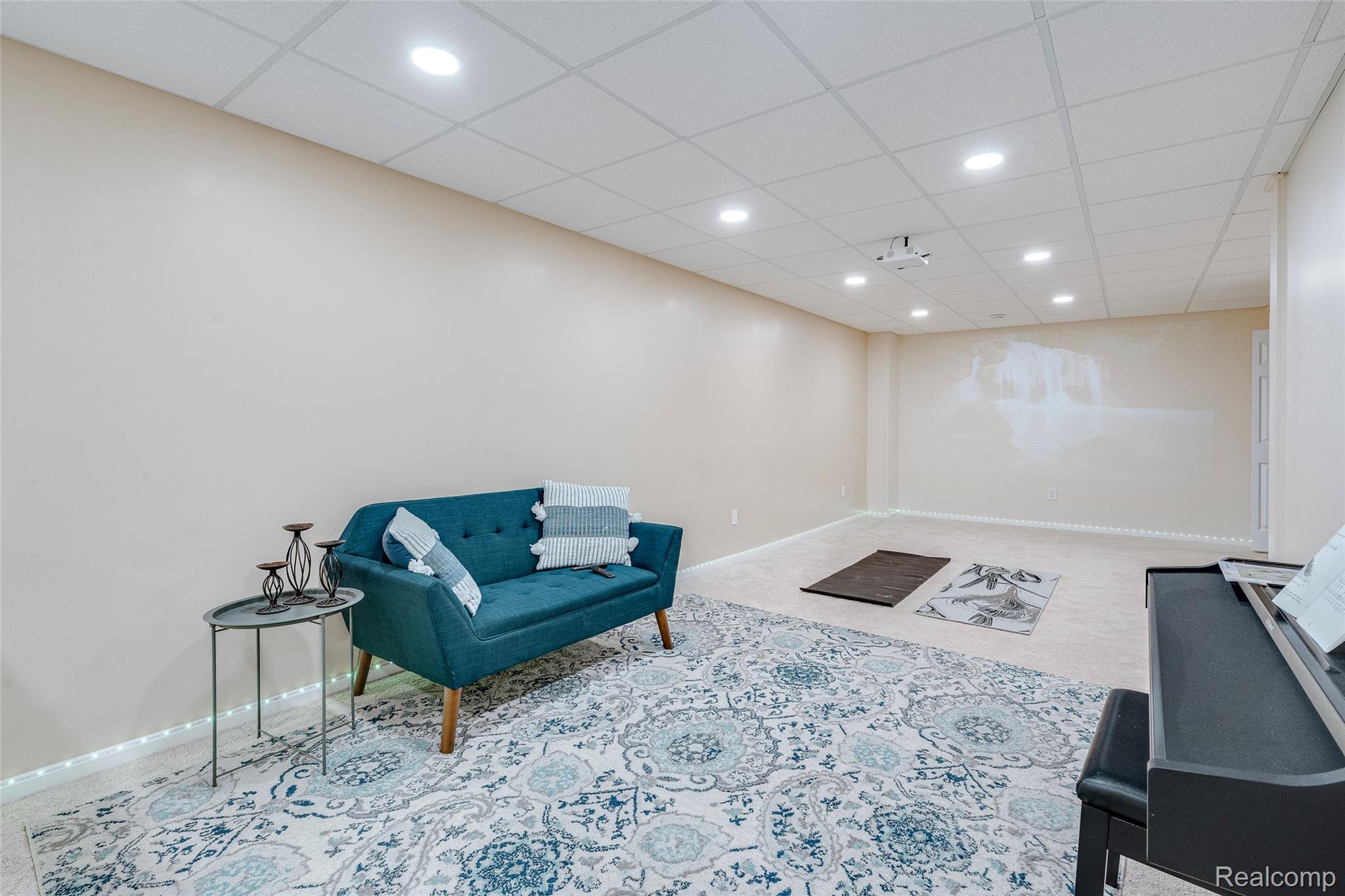51011 Rockingham Drive Canton, MI 48188 - Photo 52 of 74 Living area featuring recessed lighting, a paneled ceiling, and light colored carpet