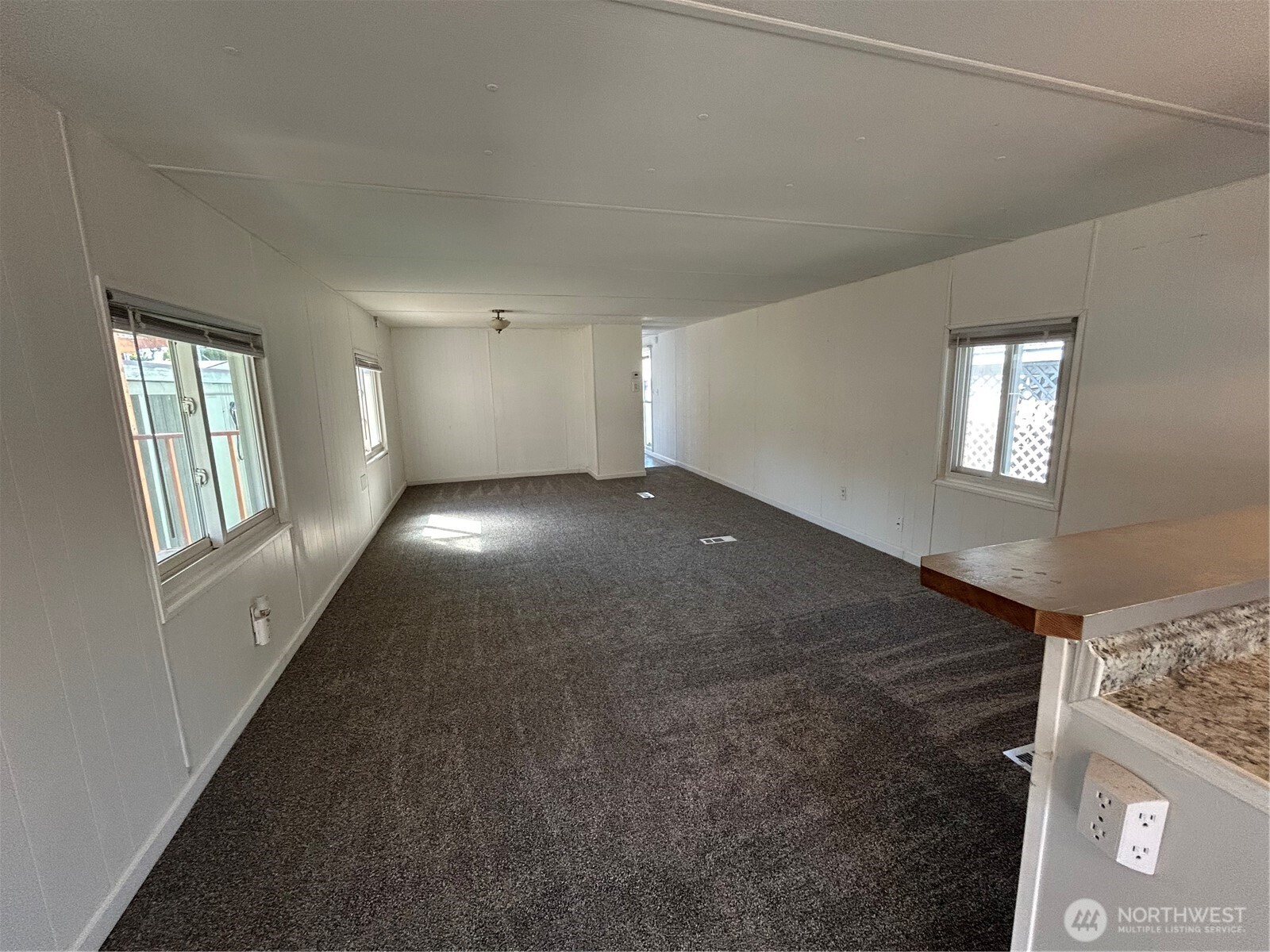 2522 Old Highway 99 South Road, Unit 23 Mount Vernon, WA 98273 - Photo 14 of 22 an empty room with windows