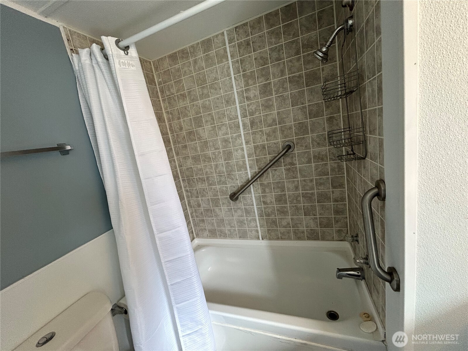 2522 Old Highway 99 South Road, Unit 23 Mount Vernon, WA 98273 - Photo 18 of 22 a bathroom with a shower and a toilet