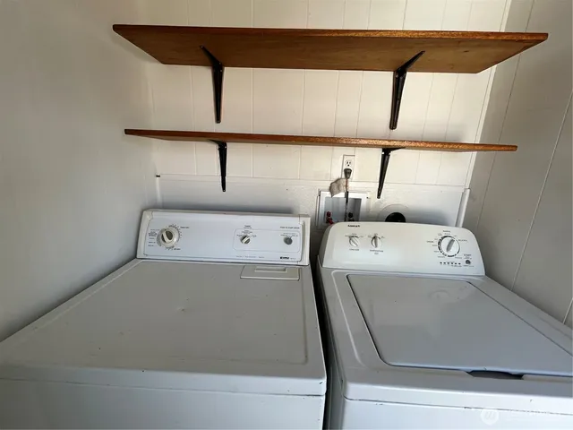a utility room with dryer and washer