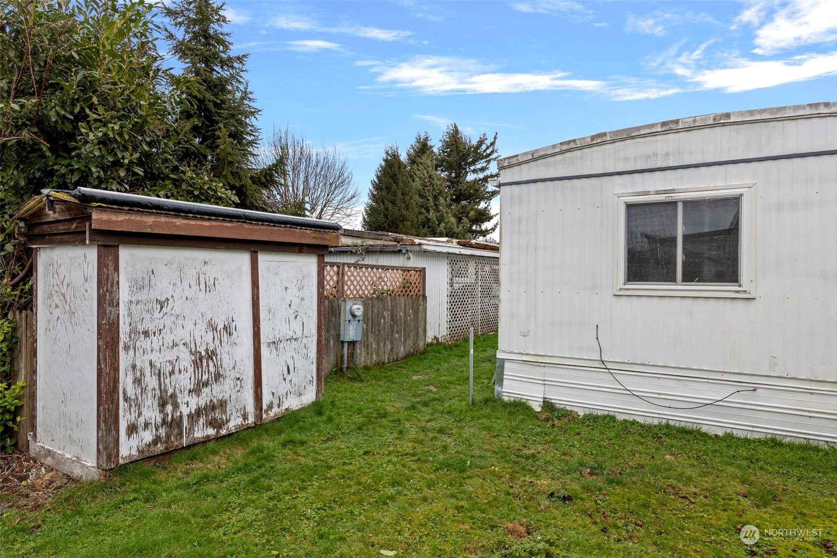2522 Old Highway 99 South Road, Unit 23 Mount Vernon, WA 98273 - Photo 6 of 22 a view of a backyard with fence