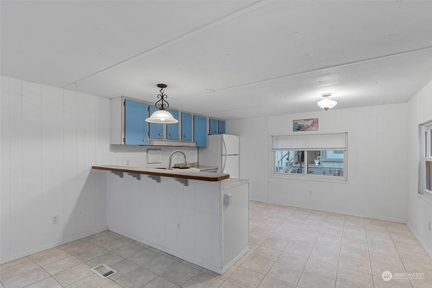 2522 Old Highway 99 South Road, Unit 23 Mount Vernon, WA 98273 - Photo 10 of 22 a kitchen with stainless steel appliances a sink stove and cabinets