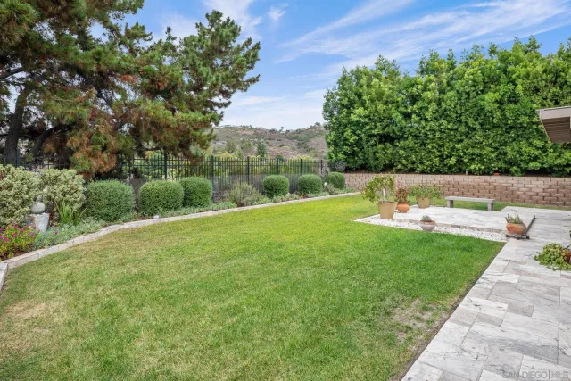 a view of a backyard with a garden