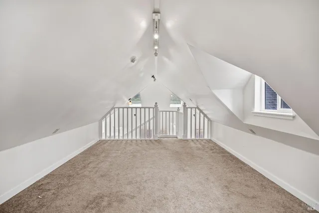 a view of a hallway with staircase