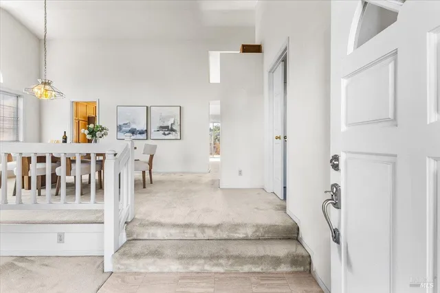a spacious bathroom with a tub and shower