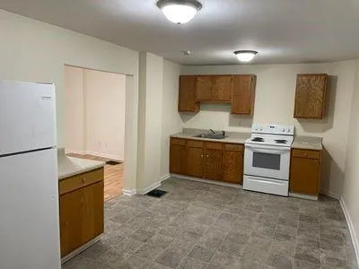 a kitchen with a stove and a microwave