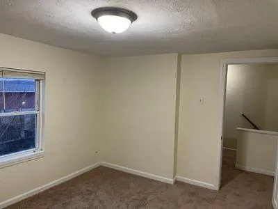 an empty room with an entryway