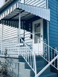 a view of entryway with a front door