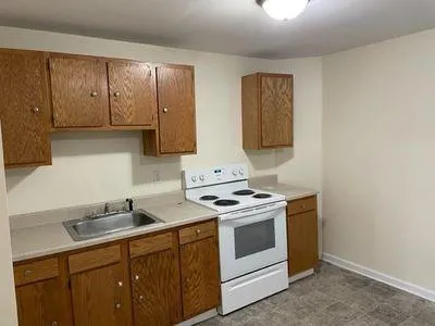 a view of a storage & utility room with closet