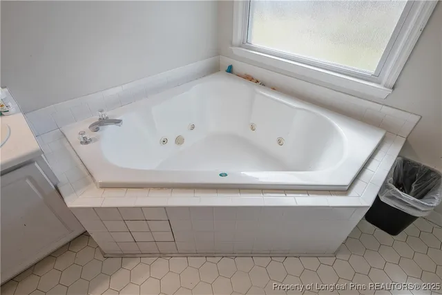 a bathroom with a bathtub