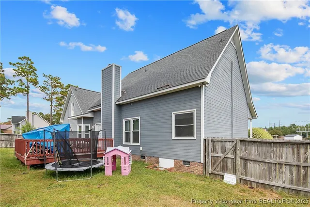 a backyard of a house with a garden