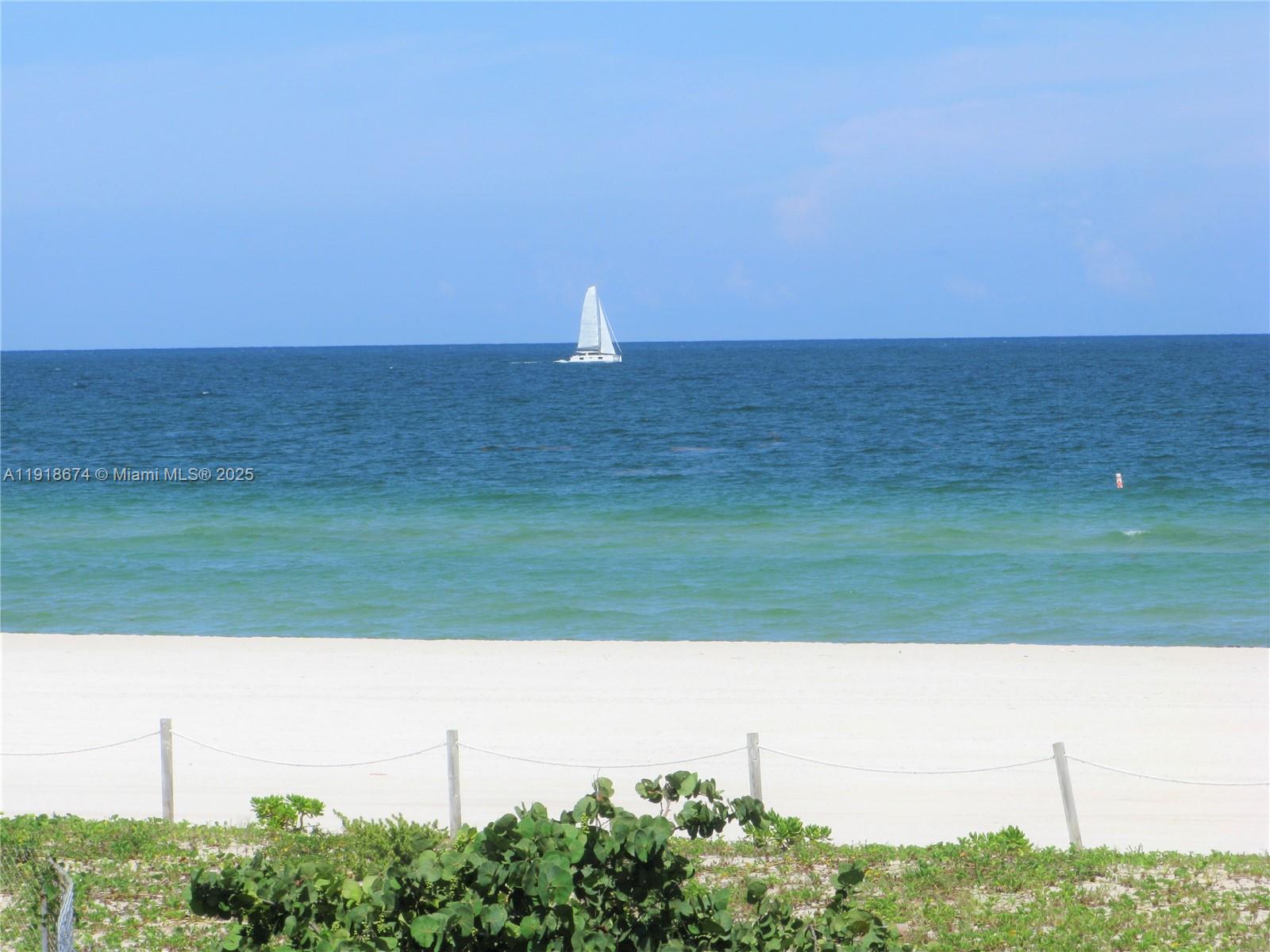 5701 Collins Avenue, Unit 808 Miami Beach, FL 33140 - Photo 16 of 40 a view of a field with an ocean
