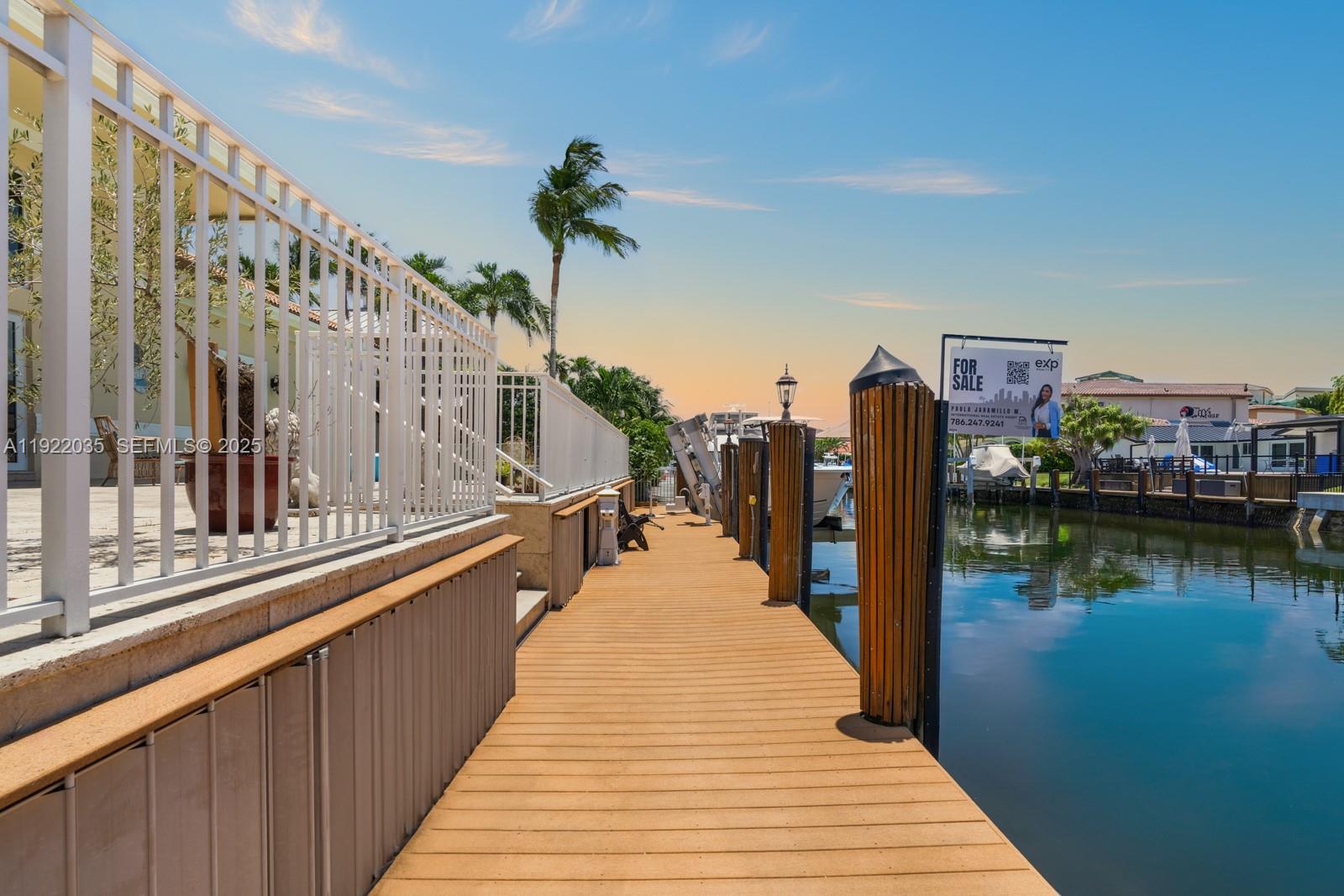 4241 Northeast 23rd Terrace Lighthouse Point, FL 33064 - Photo 14 of 26 a view of a balcony with lake