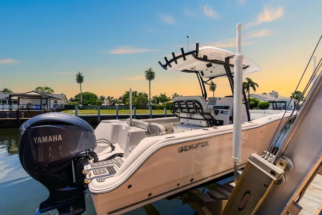 a view of a patio with a dining table and chairs