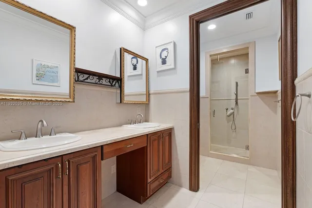 a kitchen with a sink and a refrigerator