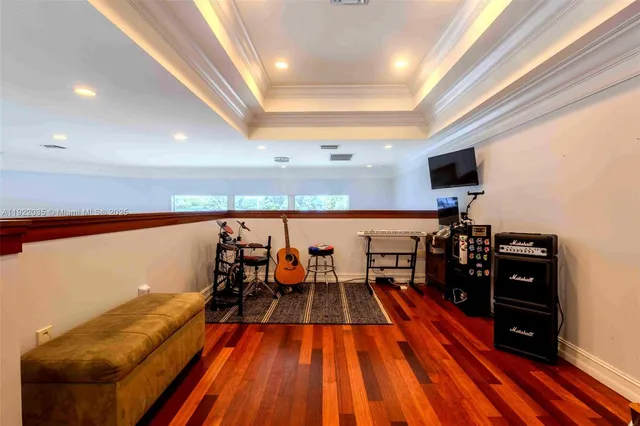 view of a room with furniture and wooden floor