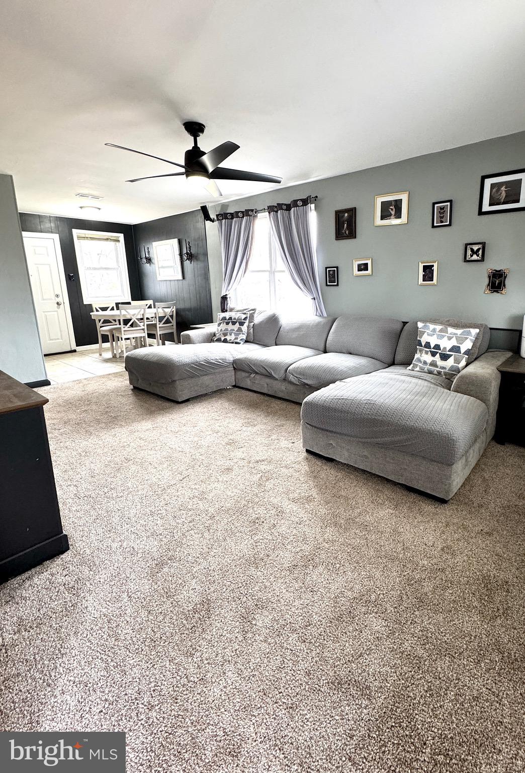 1046 Thomas Road Glen Burnie, MD 21060 - Photo 7 of 30 a bedroom with furniture and a wooden floor