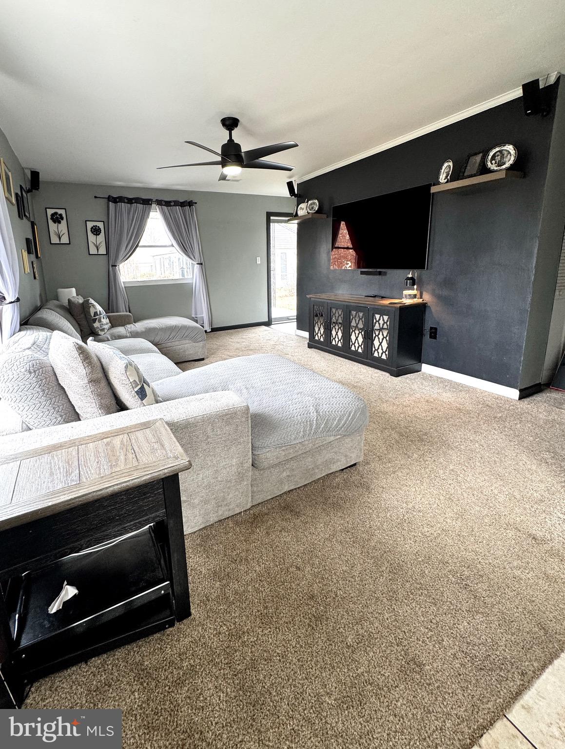 1046 Thomas Road Glen Burnie, MD 21060 - Photo 8 of 30 a bedroom with a bed and a television