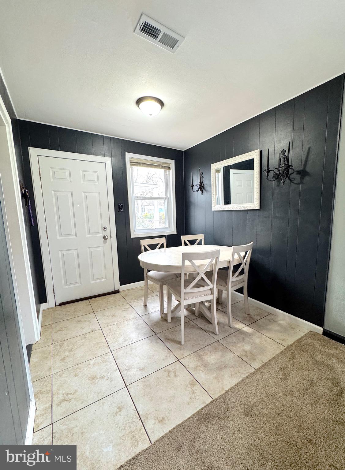 1046 Thomas Road Glen Burnie, MD 21060 - Photo 10 of 30 a view of a dining room with furniture