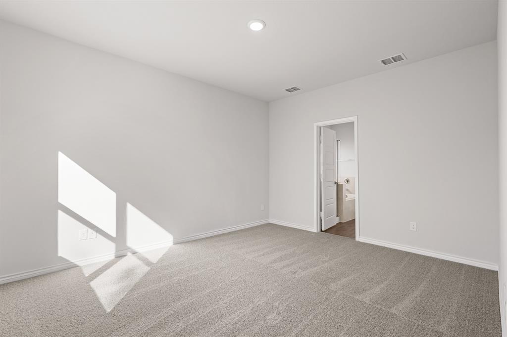 7904 Bald Cypress Road Fort Worth, TX 76123 - Photo 10 of 23 a view of an empty room