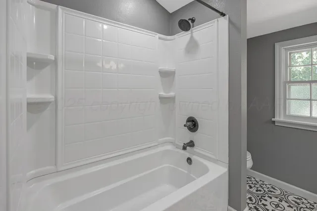 a bathroom with a bathtub