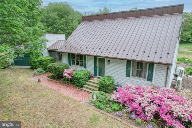 a front view of a house having yard