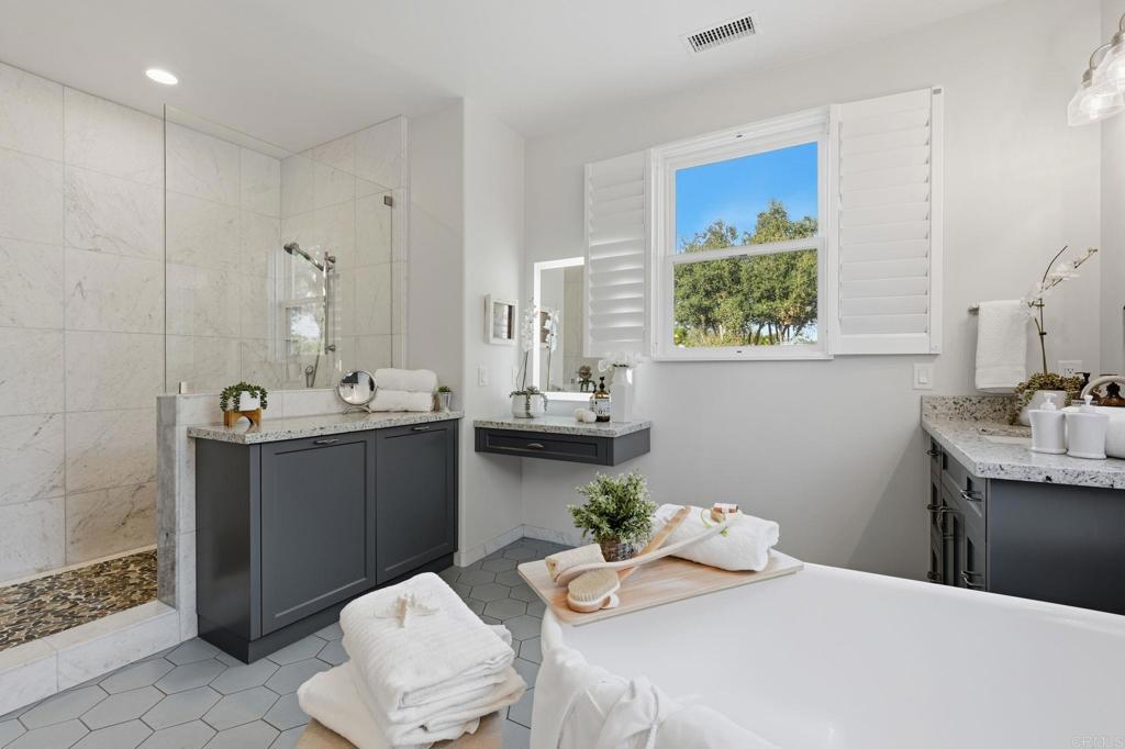 2263 Corner Creek Lane Fallbrook, CA 92028 - Photo 30 of 73 a bathroom with a sink vanity granite and toilet