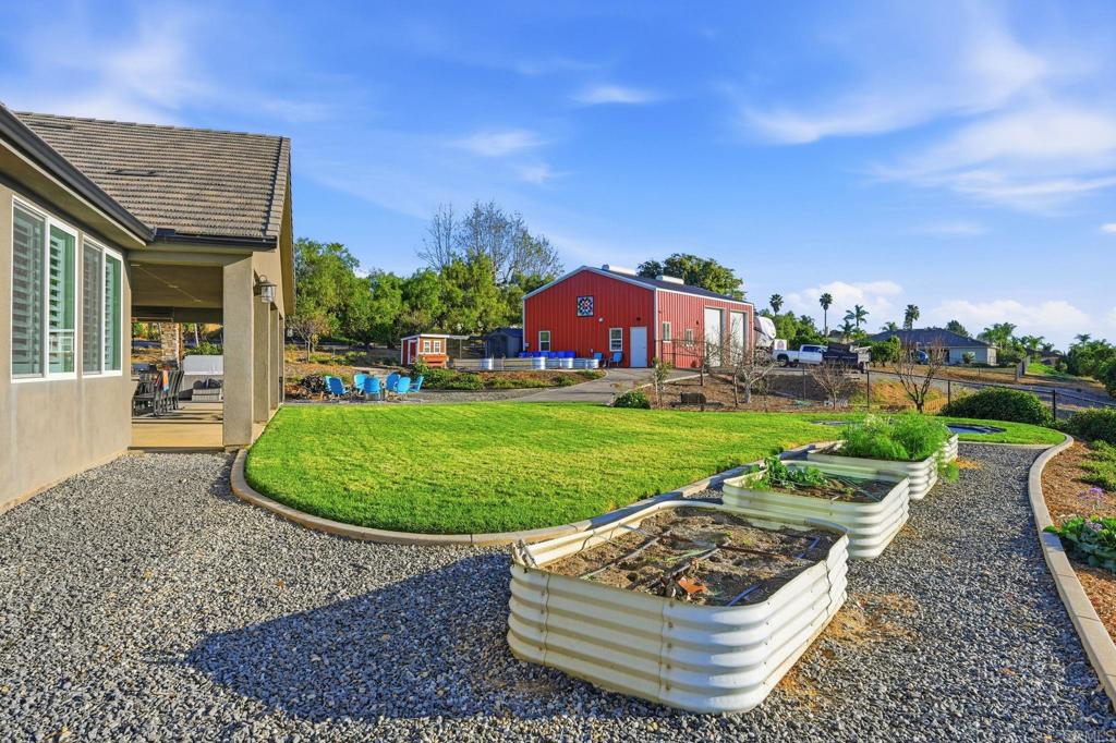 2263 Corner Creek Lane Fallbrook, CA 92028 - Photo 57 of 73 a view of a house with a yard porch and sitting area
