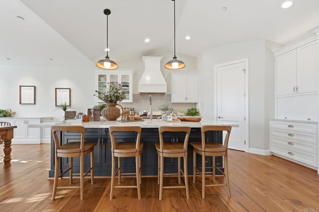2263 Corner Creek Lane Fallbrook, CA 92028 - Photo 10 of 73 a view of a dining room with furniture window and wooden floor