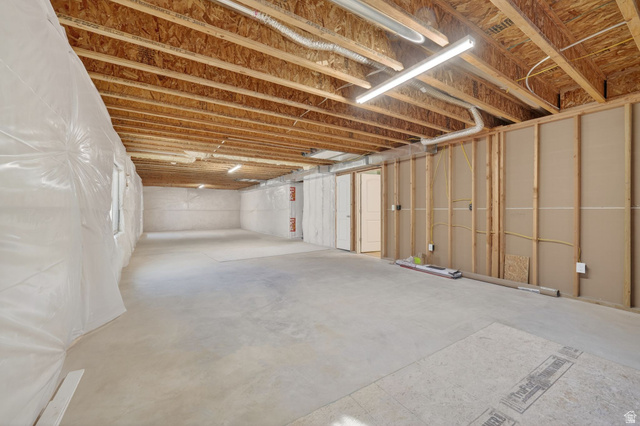 1222 West 190th Street North Mapleton, UT 84664 - Photo 39 of 46 Expansive unfinished basement featuring concrete flooring and exposed wooden joists