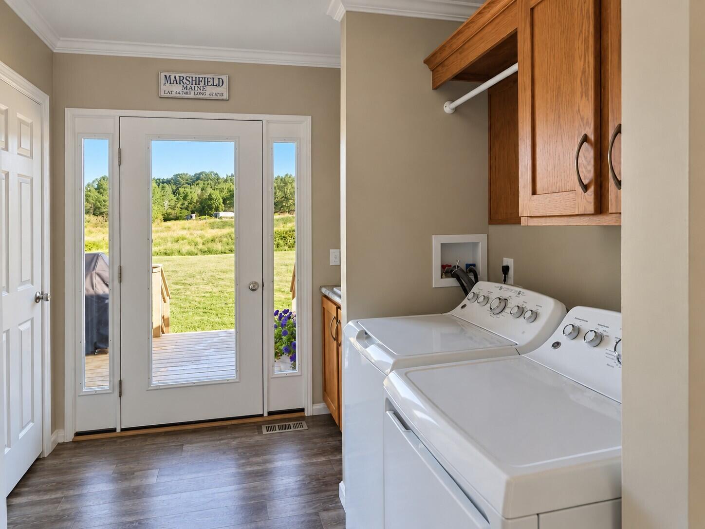 338 Marshfield Flats Road Marshfield, ME 04654 - Photo 15 of 26 Bright Mudroom Laundry with Backyard Vie