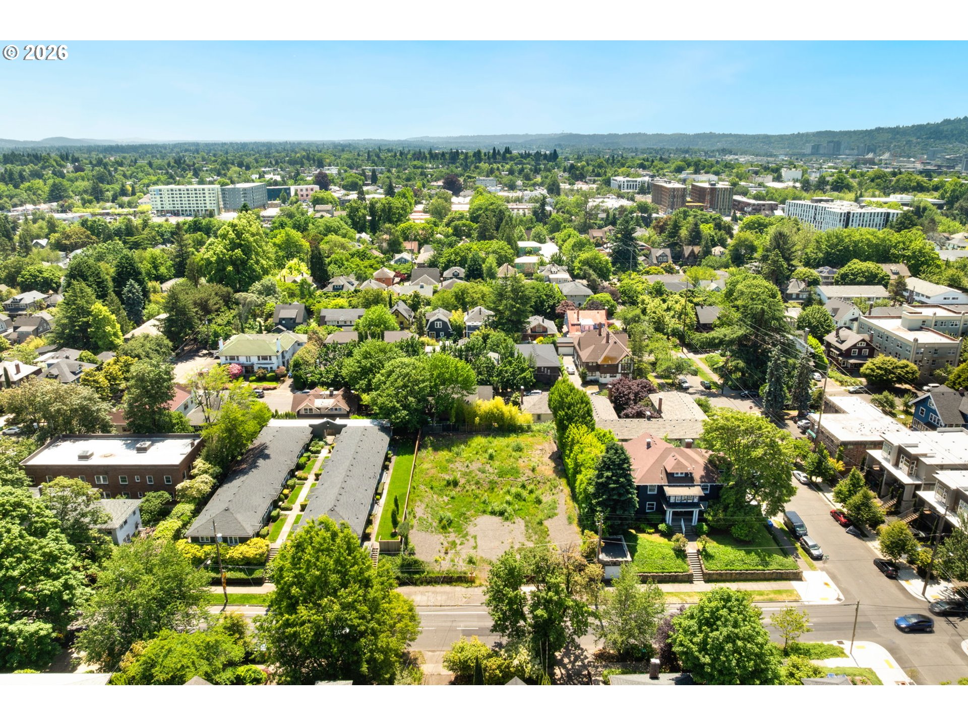 2226 Northeast Weidler Street Portland, OR 97232 - Photo 8 of 14 an aerial view of residential houses with outdoor space and trees