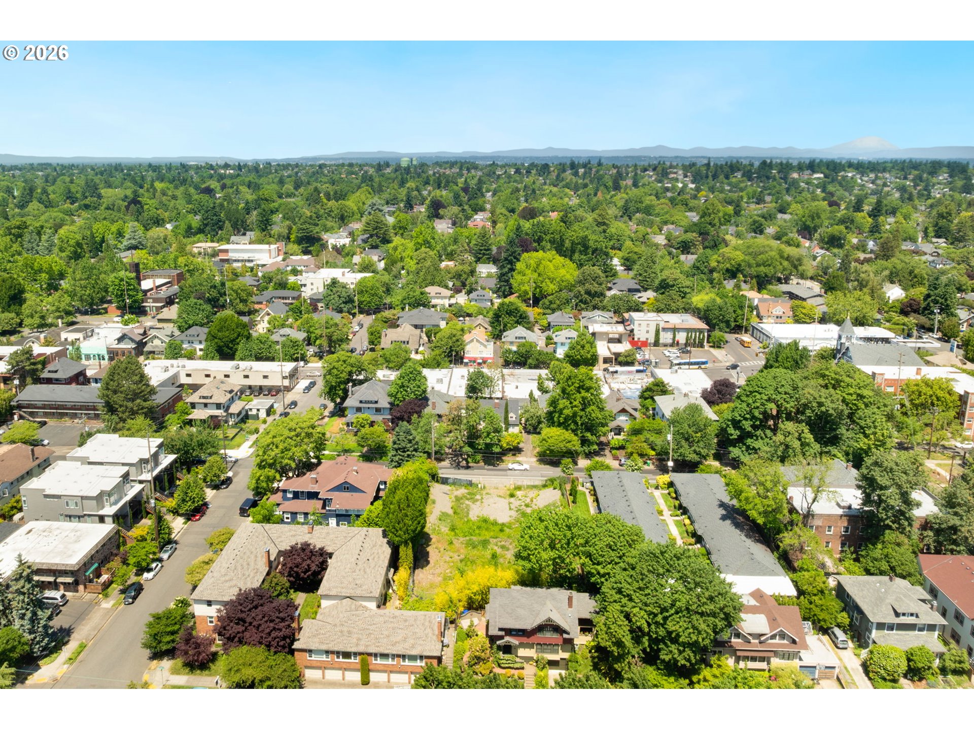 2226 Northeast Weidler Street Portland, OR 97232 - Photo 10 of 14 an aerial view of residential houses with outdoor space and trees