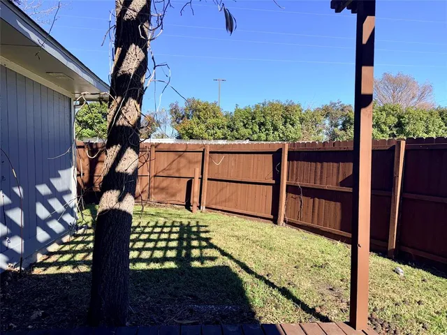 a view of a porch with a tree