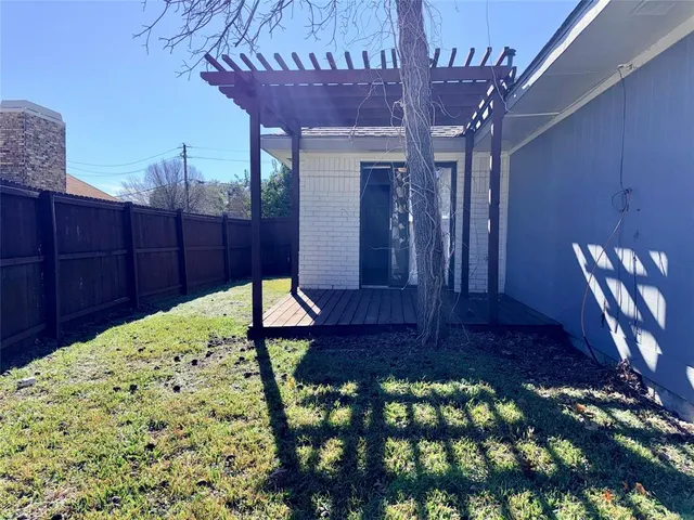 a view of balcony with furniture