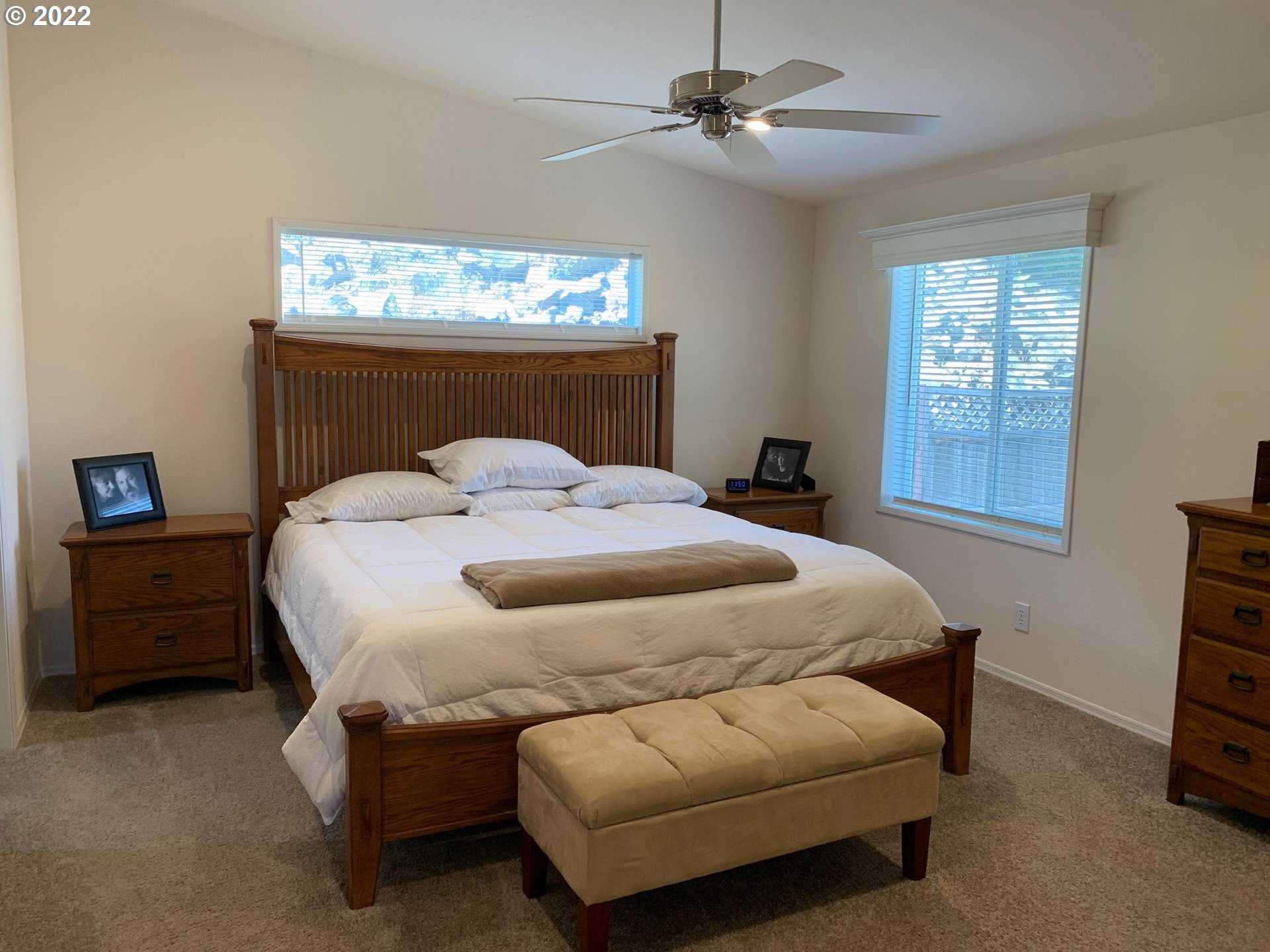 229 Lucky Ridge Loop Canyonville, OR 97417 - Photo 16 of 32 a bedroom with a bed chair and a window