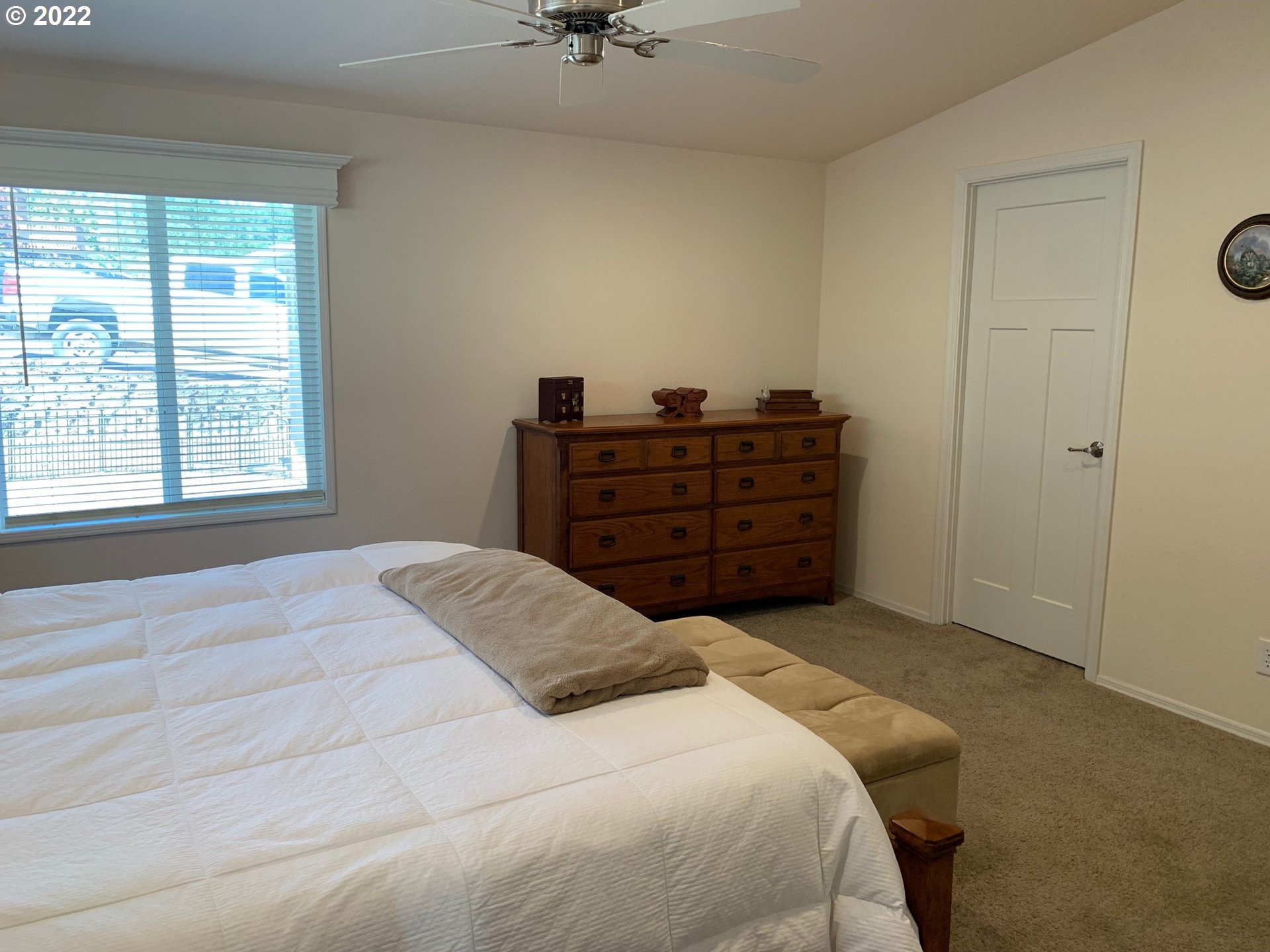 229 Lucky Ridge Loop Canyonville, OR 97417 - Photo 17 of 32 a bedroom with a bed and a dresser