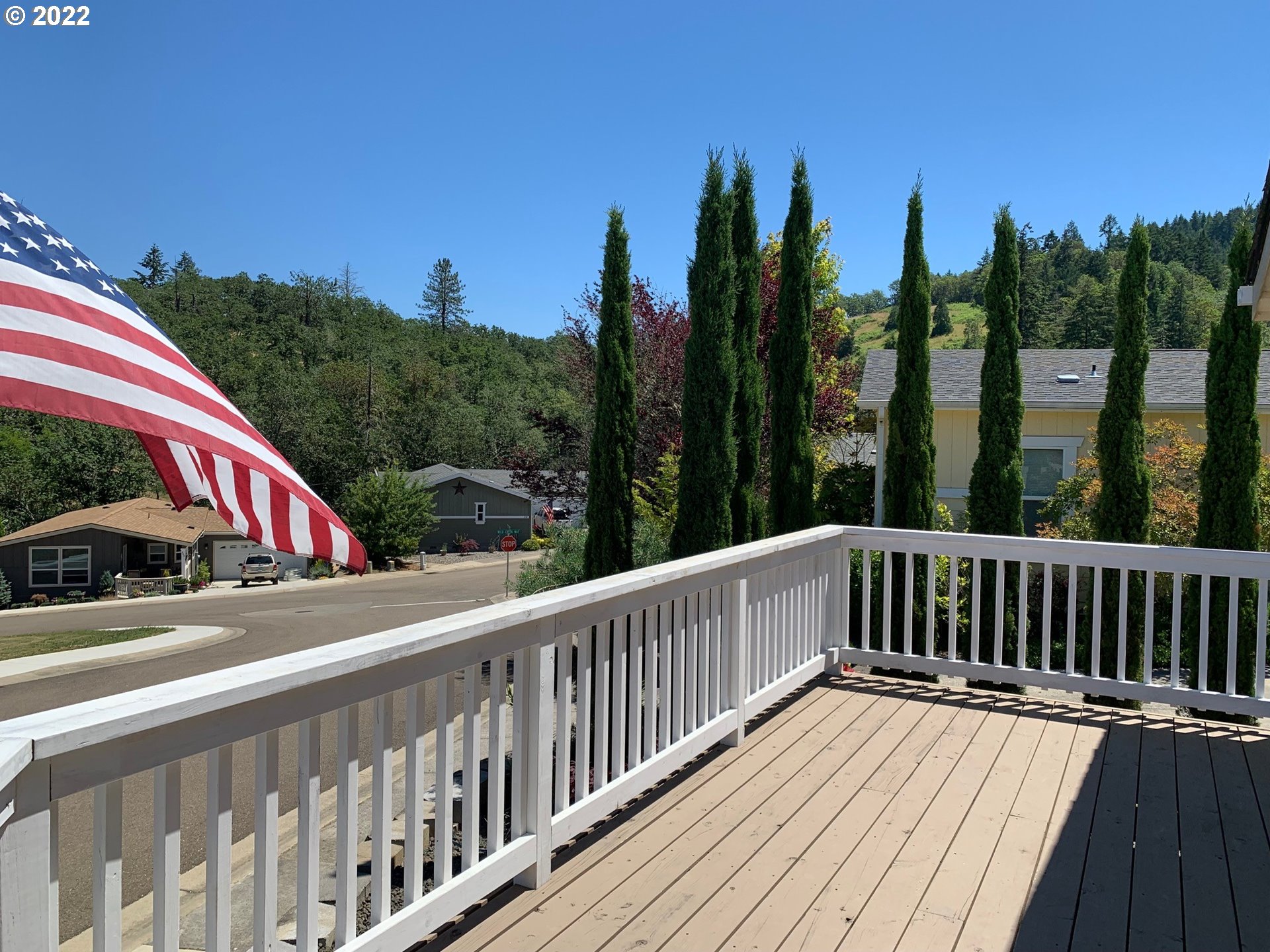 229 Lucky Ridge Loop Canyonville, OR 97417 - Photo 4 of 32 a view of a two chairs on the roof deck