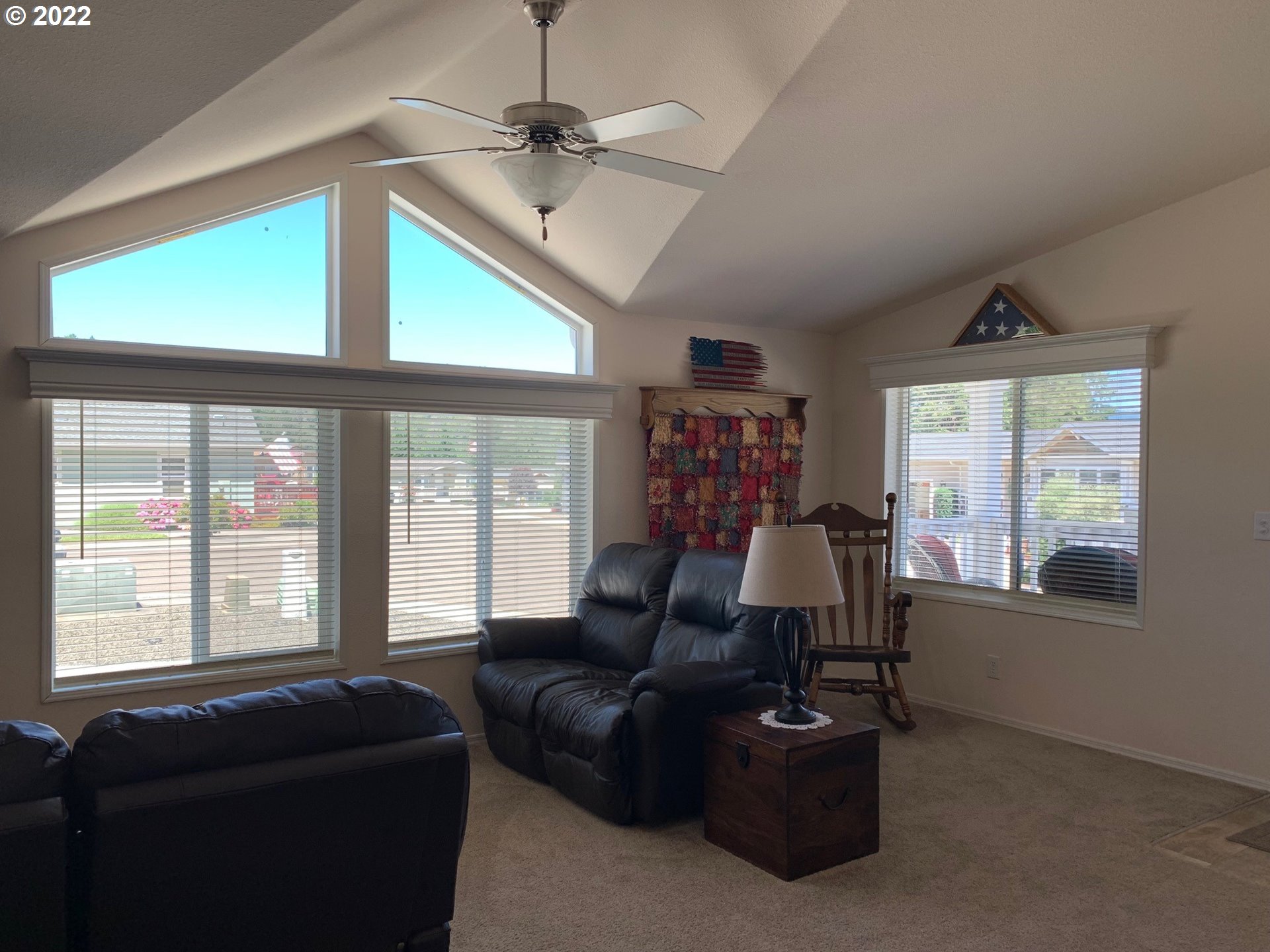 229 Lucky Ridge Loop Canyonville, OR 97417 - Photo 6 of 32 a living room with furniture and a flat screen tv