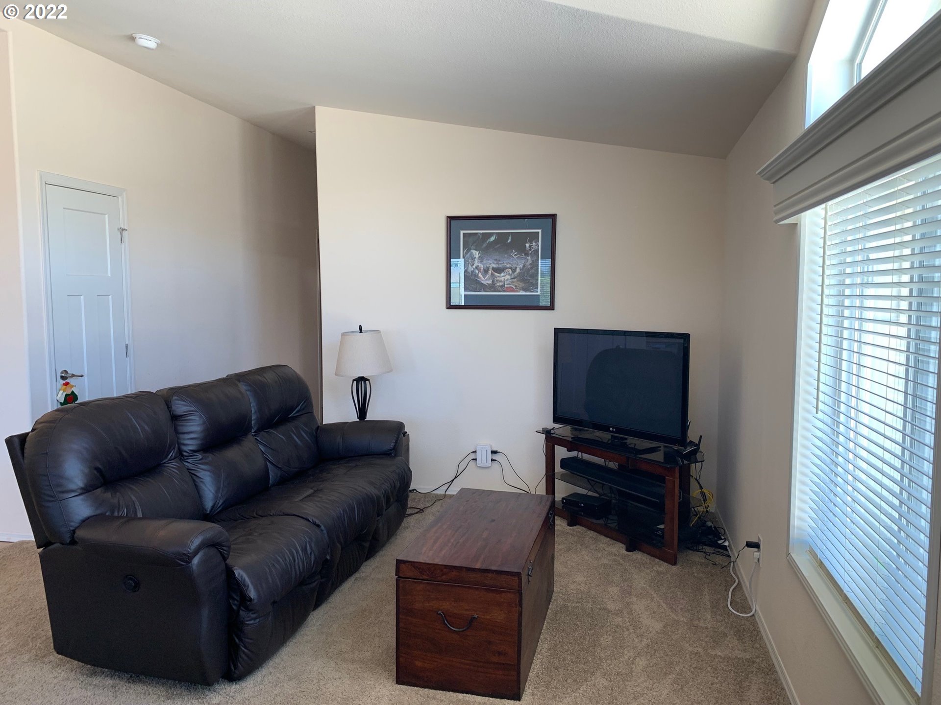 229 Lucky Ridge Loop Canyonville, OR 97417 - Photo 8 of 32 a living room with furniture and a flat screen tv